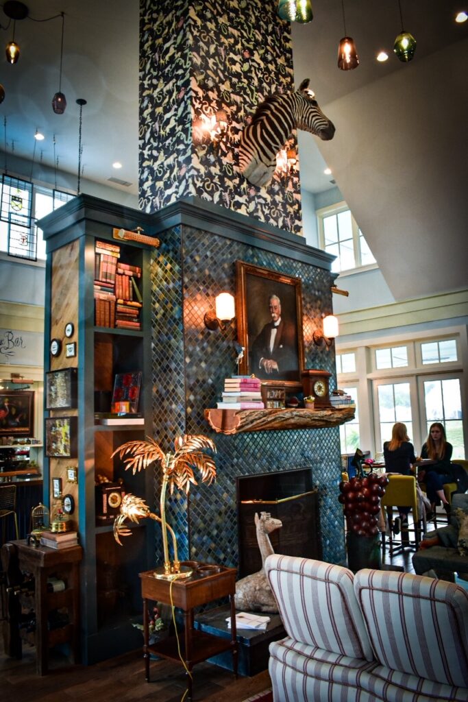 Eclectic tasting room with zebra decor and cozy seating at Merrie Mill Farm & Vineyard.