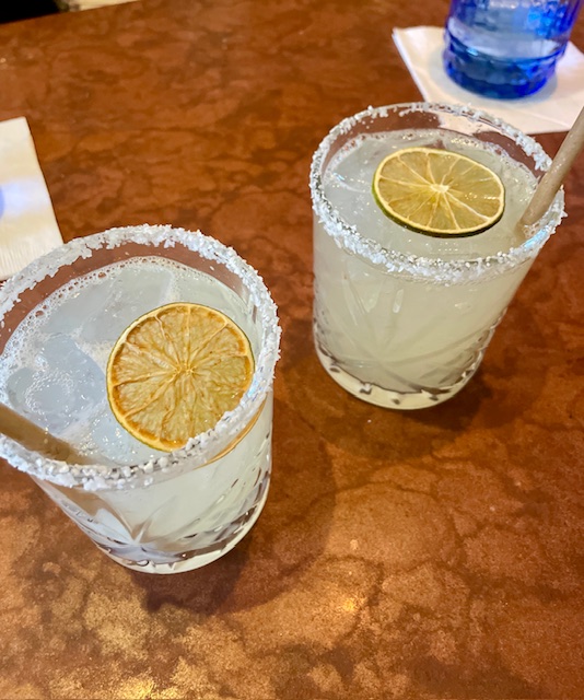 Two margaritas with a salted rim at a bar in Santa Fe, New Mexico