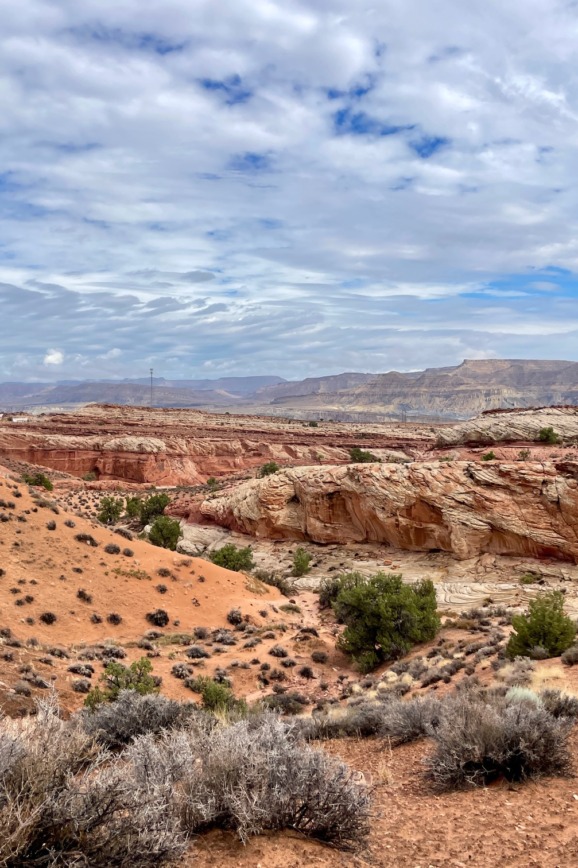 Expansive view of the Vermilion Cliffs National Monument in northern Arizona, showcasing rugged red rock canyons and mesas