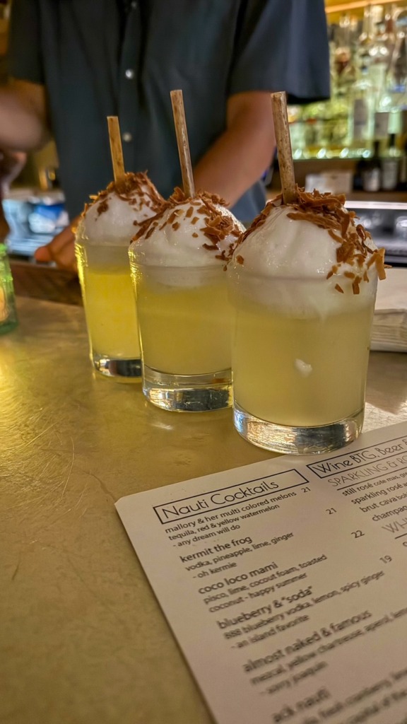 Signature coconut-topped cocktails at The Nautilus bar in Nantucket