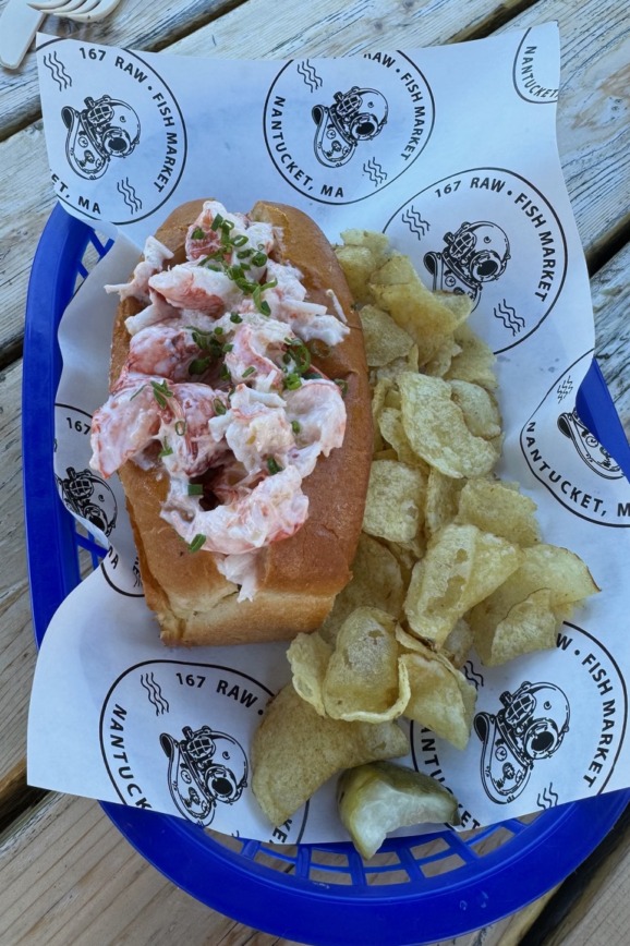 Fresh lobster roll served with kettle chips at 167 Raw Fish Market in Nantucket, Massachusetts